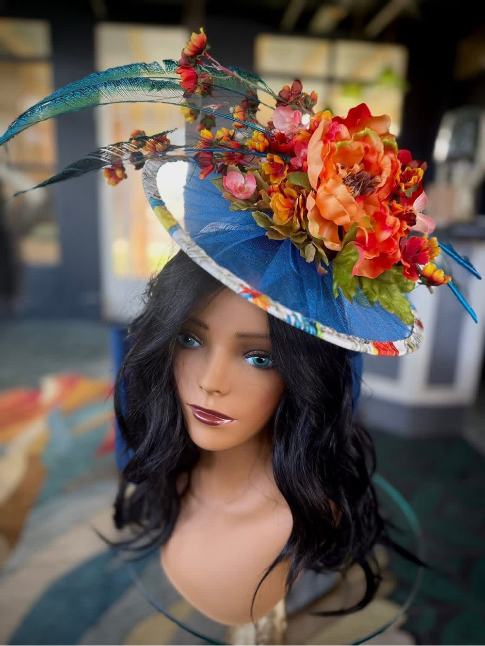 Floral Feathered Fascinator Hat - Blue with Orange & Pink Flowers